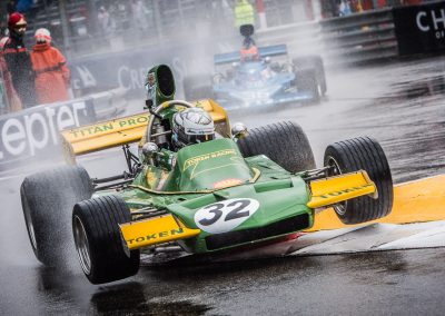 Classic F1 car jump kerb in rain