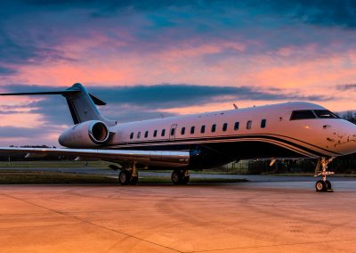 private jet at sunset