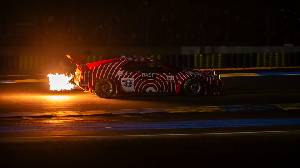 Huge flames fire from the exhaust of this classic BMW M1