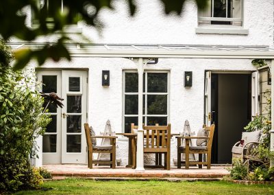 white-house-patio-chairs-table-outdoor-living