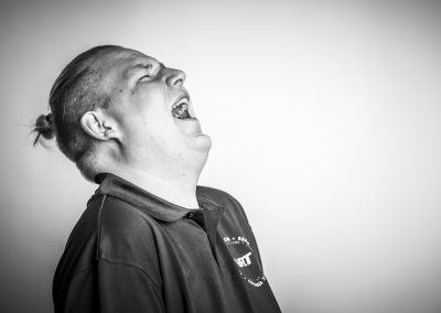 man-laughing-headshots-photography-monochrome